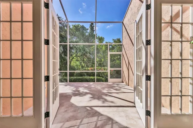 a view of a swimming pool with a patio