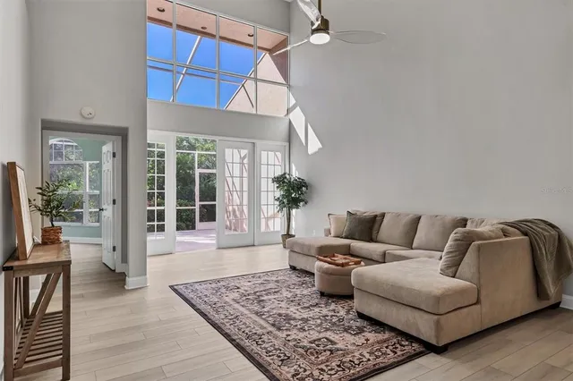 a living room with furniture and a rug