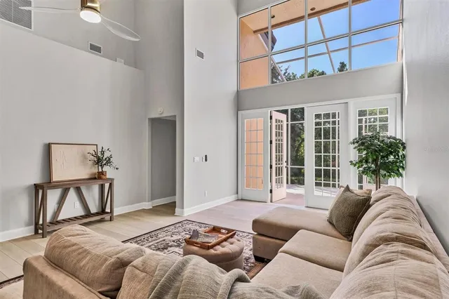 a living room with furniture and a rug