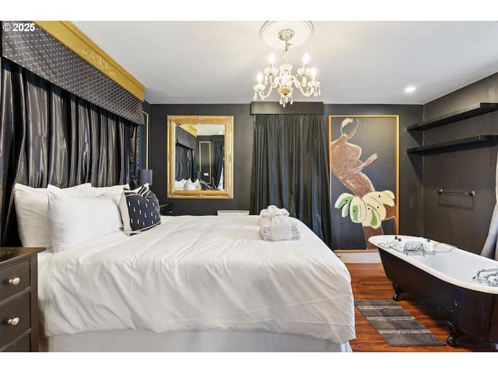 610 West Fourth Plain Boulevard Vancouver, WA 98660 - Photo 16 of 41 a bedroom with bed and window