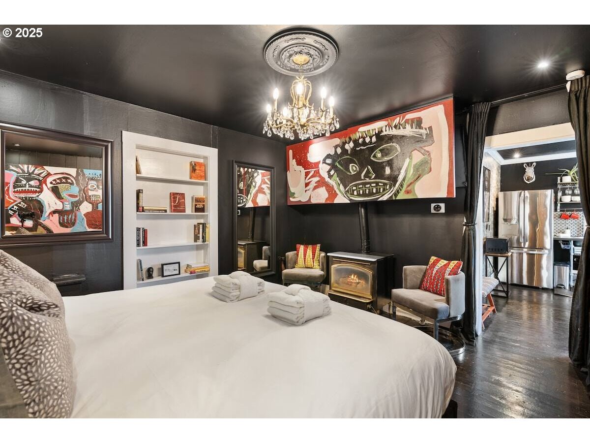 610 West Fourth Plain Boulevard Vancouver, WA 98660 - Photo 31 of 41 a bedroom with a bed and window