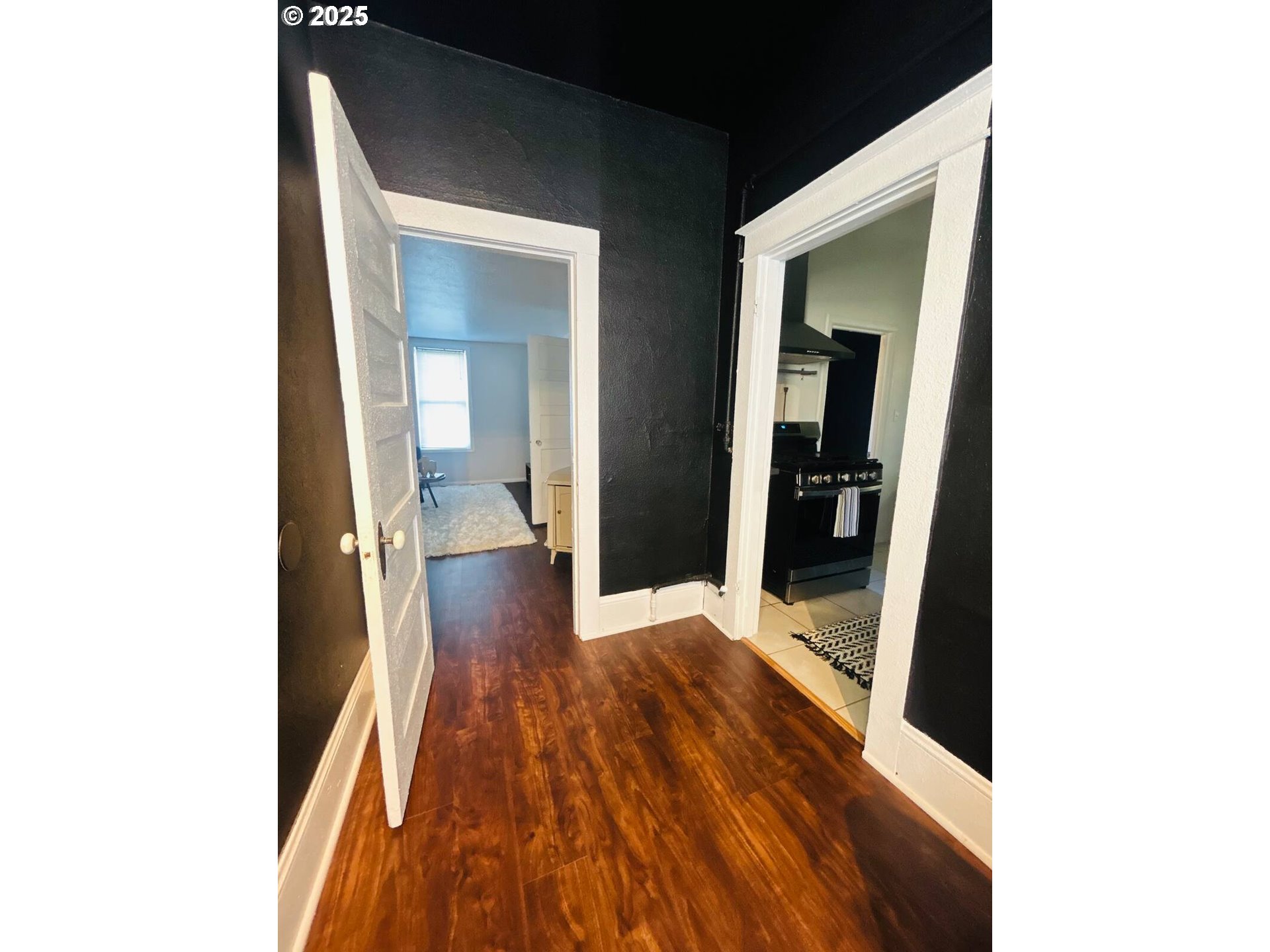610 West Fourth Plain Boulevard Vancouver, WA 98660 - Photo 34 of 41 a view of a hallway with wooden floor and staircase