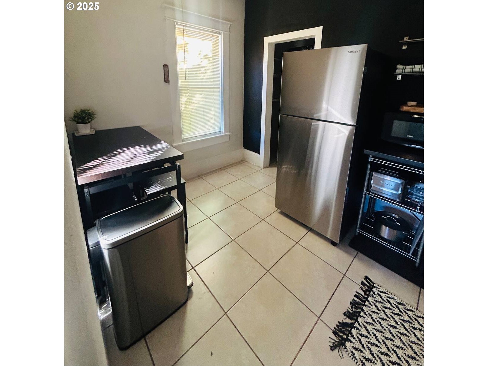 610 West Fourth Plain Boulevard Vancouver, WA 98660 - Photo 35 of 41 a kitchen with a refrigerator and a stove top oven