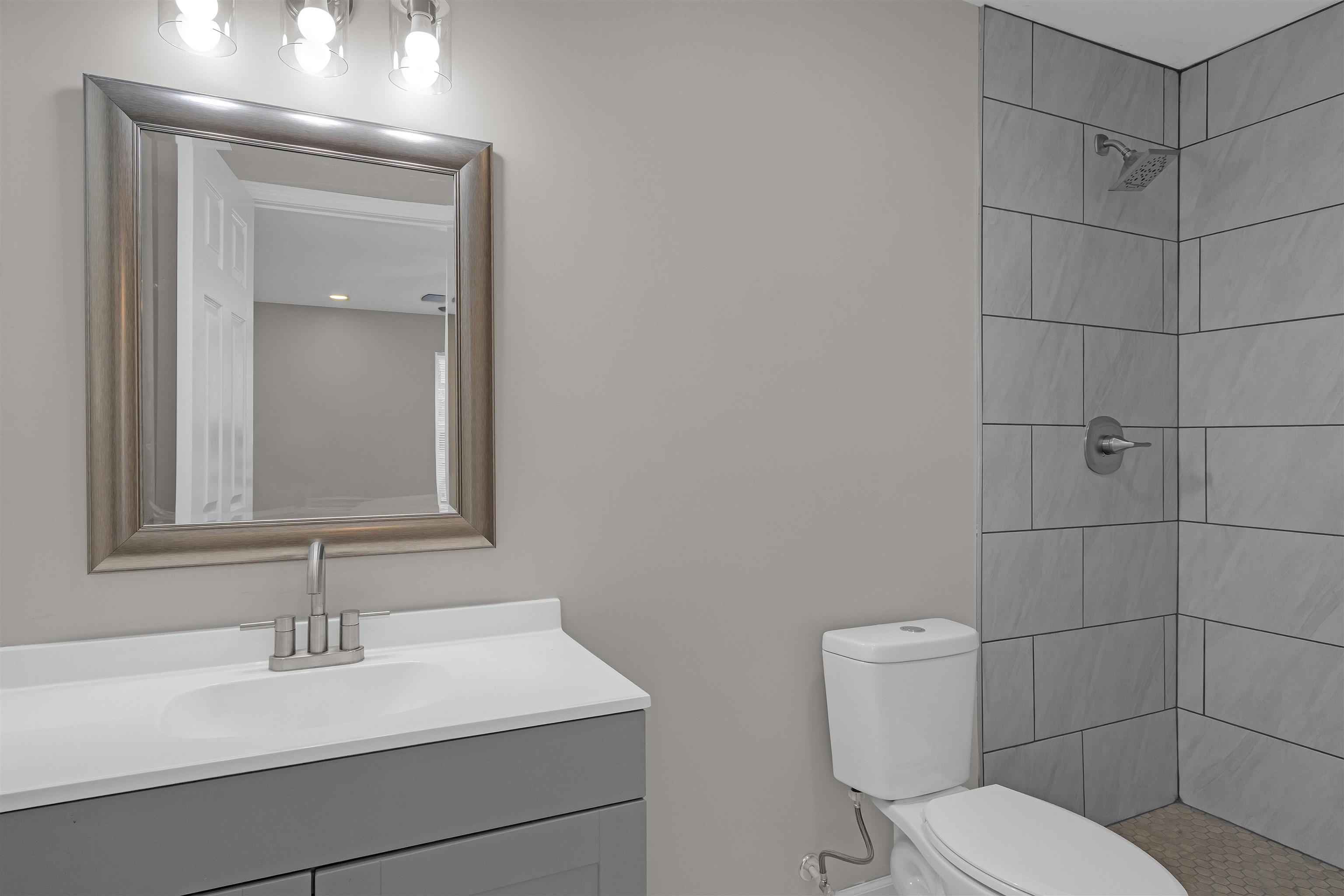 830 David Street Memphis, TN 38114 - Photo 11 of 16 a bathroom with a sink toilet and shower