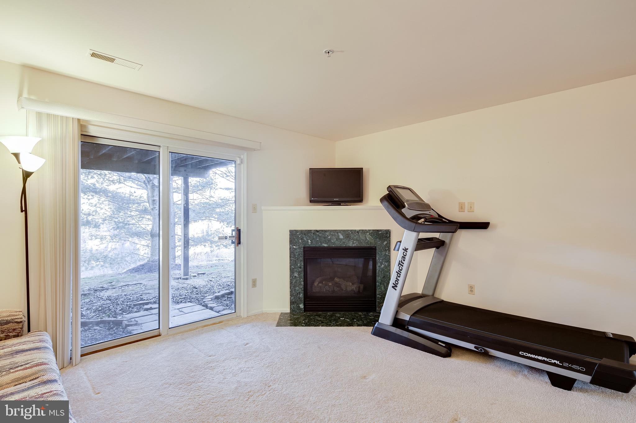 6307 Wind Rider Way Columbia, MD 21045 - Photo 27 of 33 Entry Level - Family Room w/ Gas FP