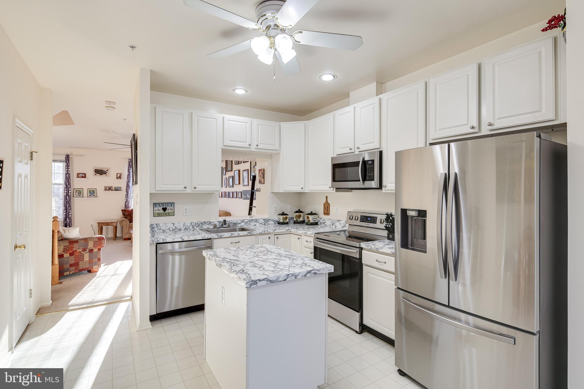 6307 Wind Rider Way Columbia, MD 21045 - Photo 6 of 33 Kitchen w/ Center Island