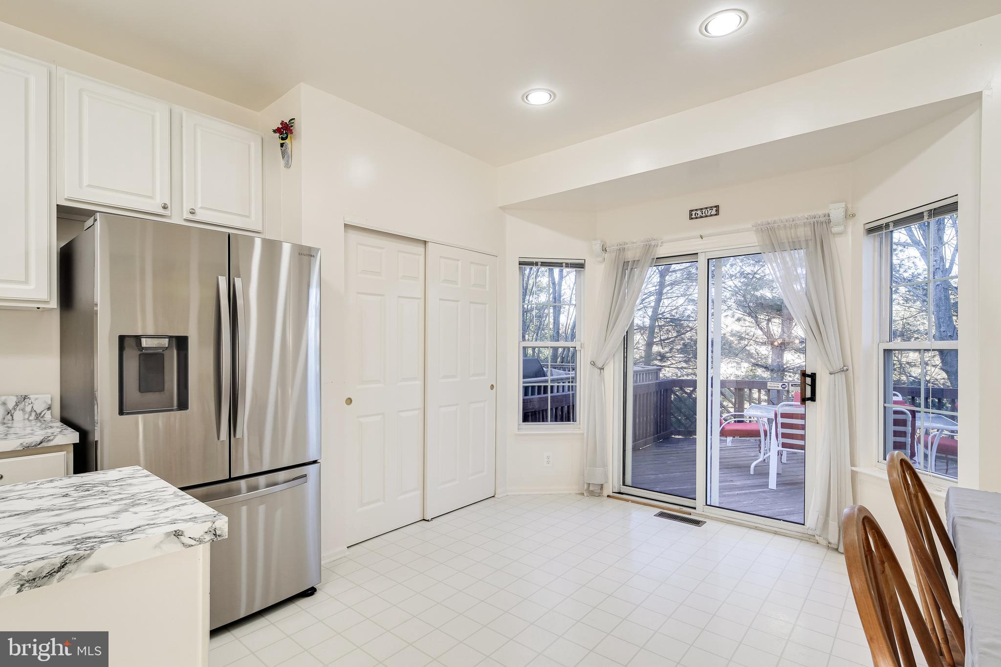 6307 Wind Rider Way Columbia, MD 21045 - Photo 9 of 33 Eat-In Kitchen w/ Deck Access
