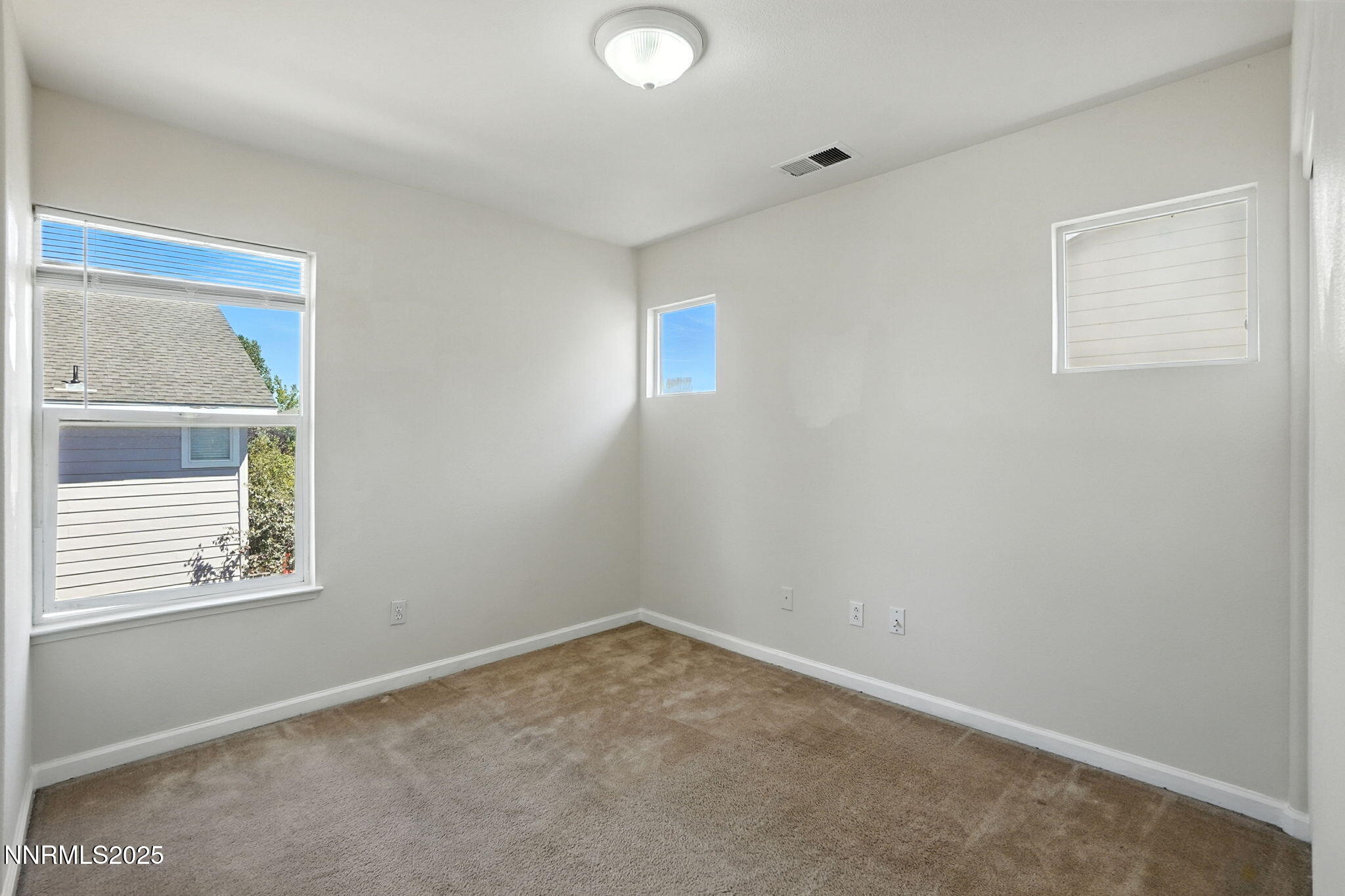 9248 Running Dog Circle Reno, NV 89506 - Photo 17 of 20 an empty room with a window