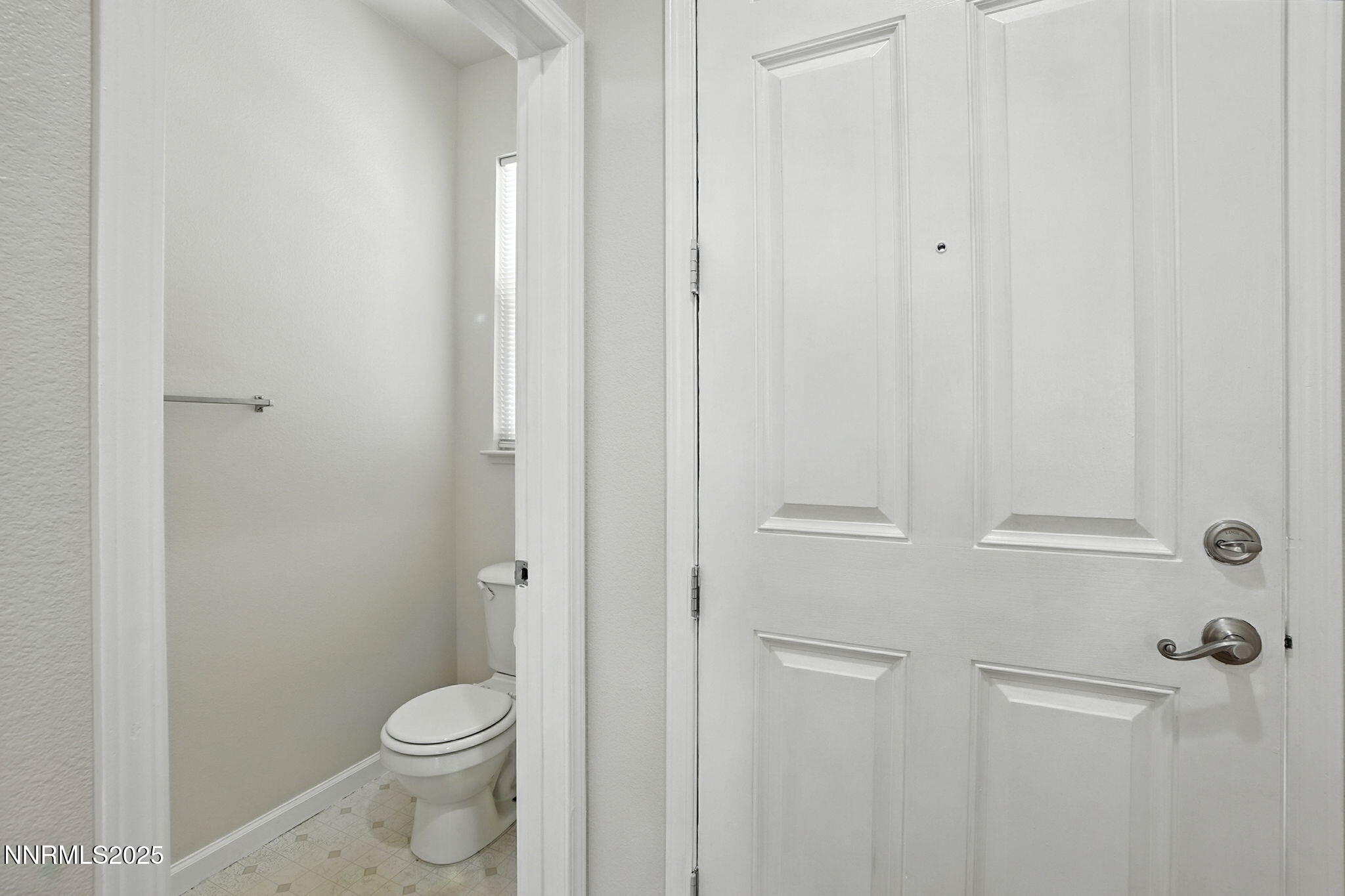 9248 Running Dog Circle Reno, NV 89506 - Photo 7 of 20 a white toilet sitting next to a shower