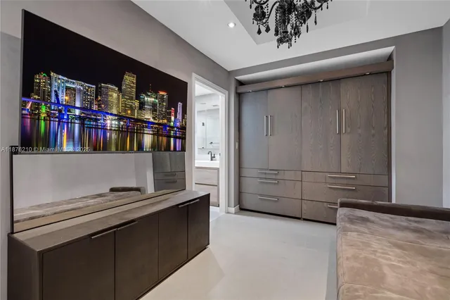 a kitchen with stainless steel appliances cabinets and a window