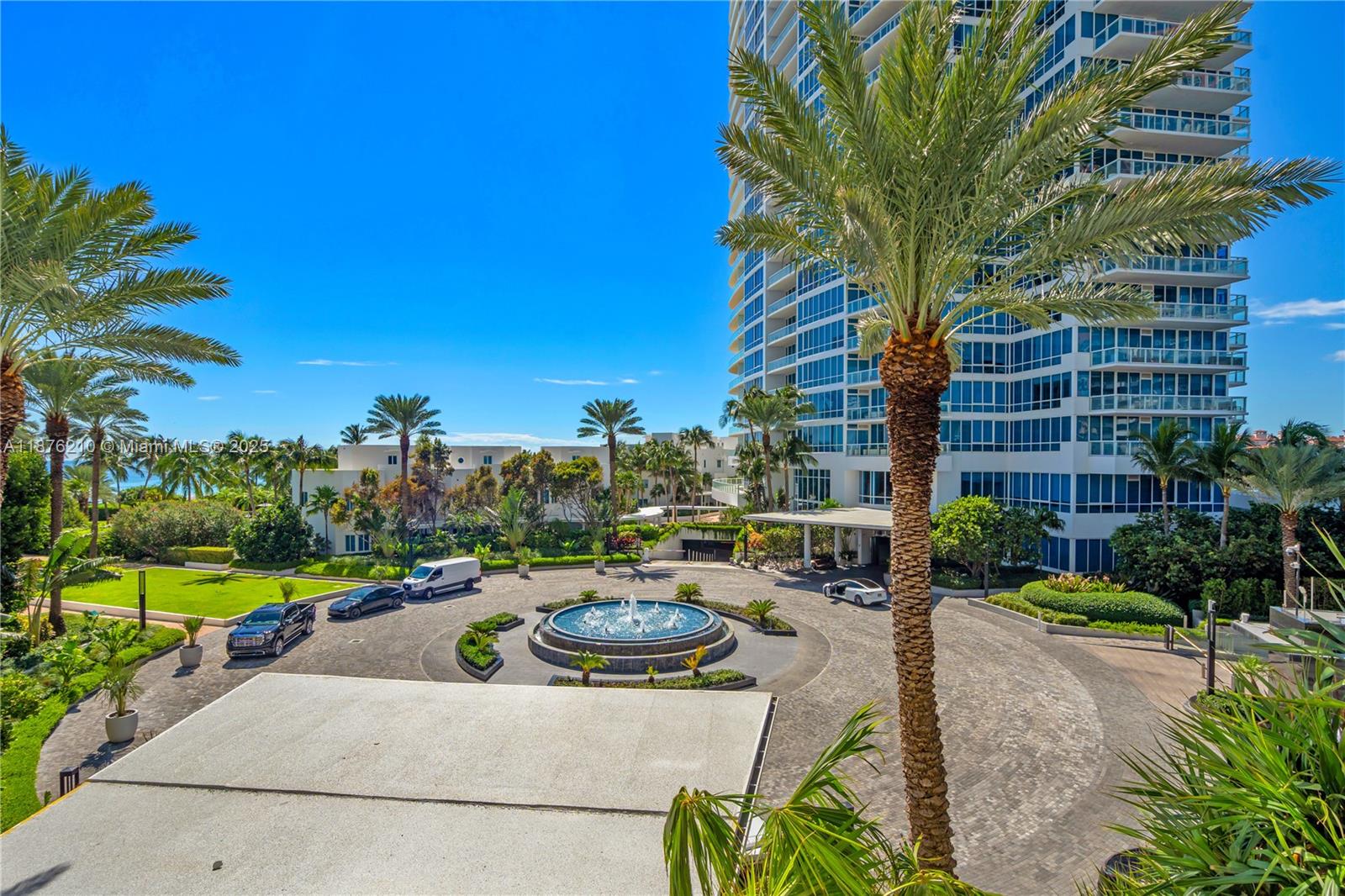 50 South Pointe Drive, Unit 606 Miami Beach, FL 33139 - Photo 6 of 36 a view of a patio with a table and chairs
