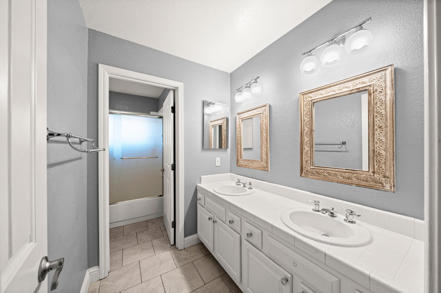 5116 Camden Road Rocklin, CA 95765 - Photo 20 of 31 a spacious bathroom with a double vanity sink mirror and double