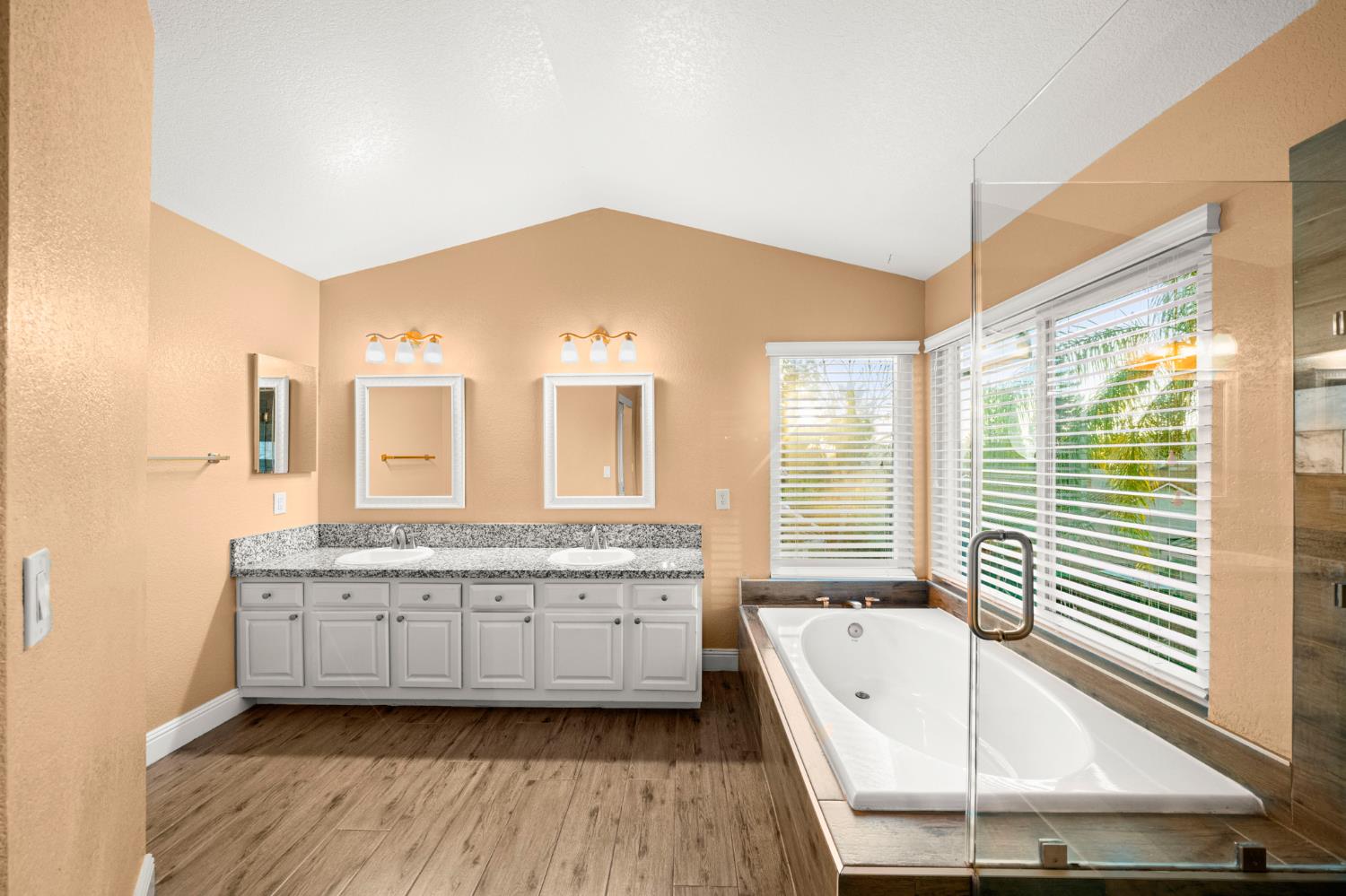 5116 Camden Road Rocklin, CA 95765 - Photo 26 of 31 a spacious bathroom with a large tub and shower
