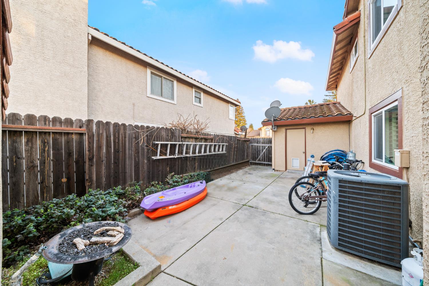 5116 Camden Road Rocklin, CA 95765 - Photo 31 of 31 a view of a chair and table in backyard