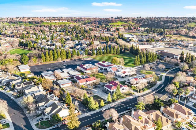 an aerial view of a house with a garden