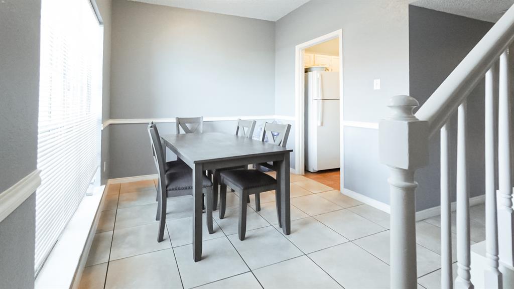 12921 Abrams Road, Unit 505 Dallas, TX 75243 - Photo 3 of 24 Dining area featuring light tile patterned floors
