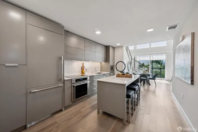 a view of a kitchen area with furniture