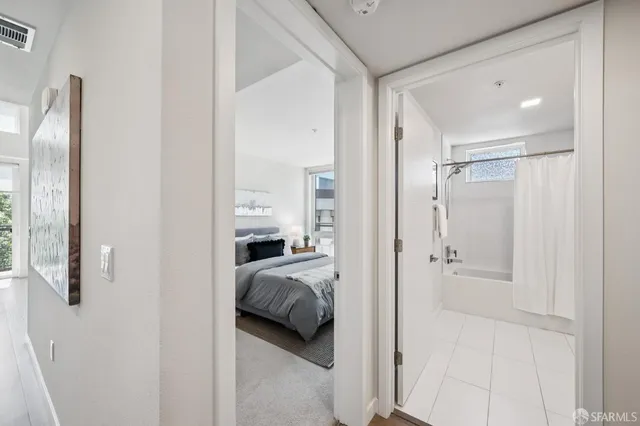 a bed room with furniture and a large window