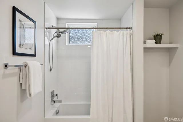 a workspace with furniture and a window