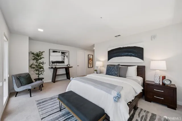 a bathroom with a sink double vanity and a mirror
