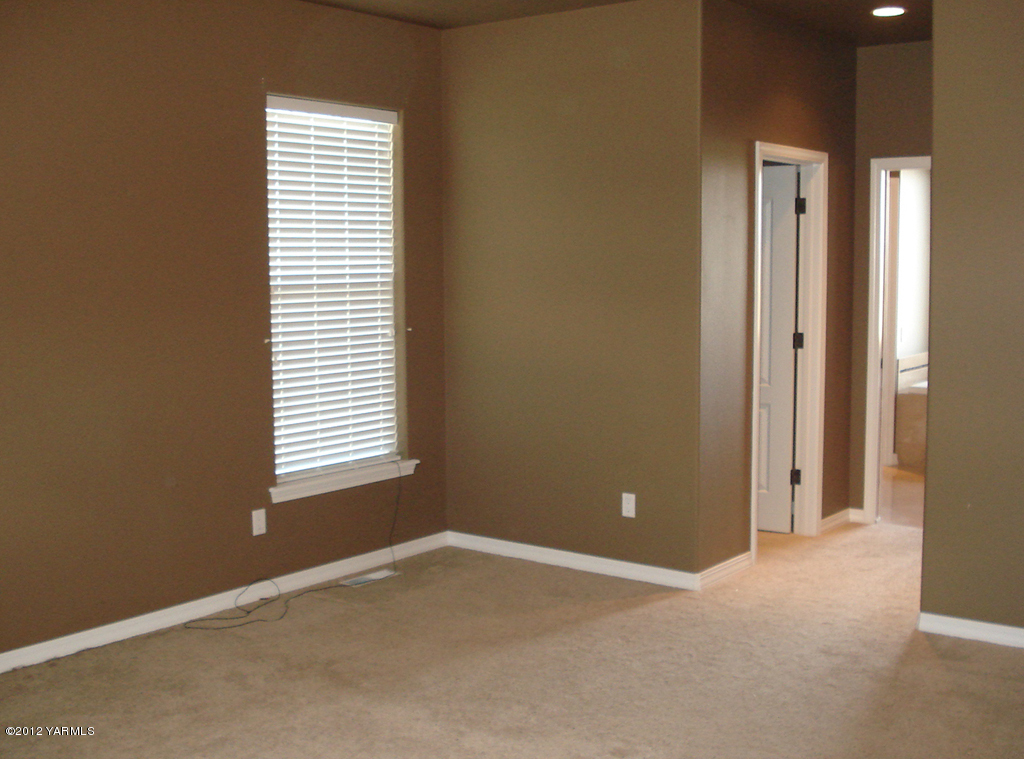 840 Dilley Road Tieton, WA 98947 - Photo 13 of 23 a view of an empty room with a window
