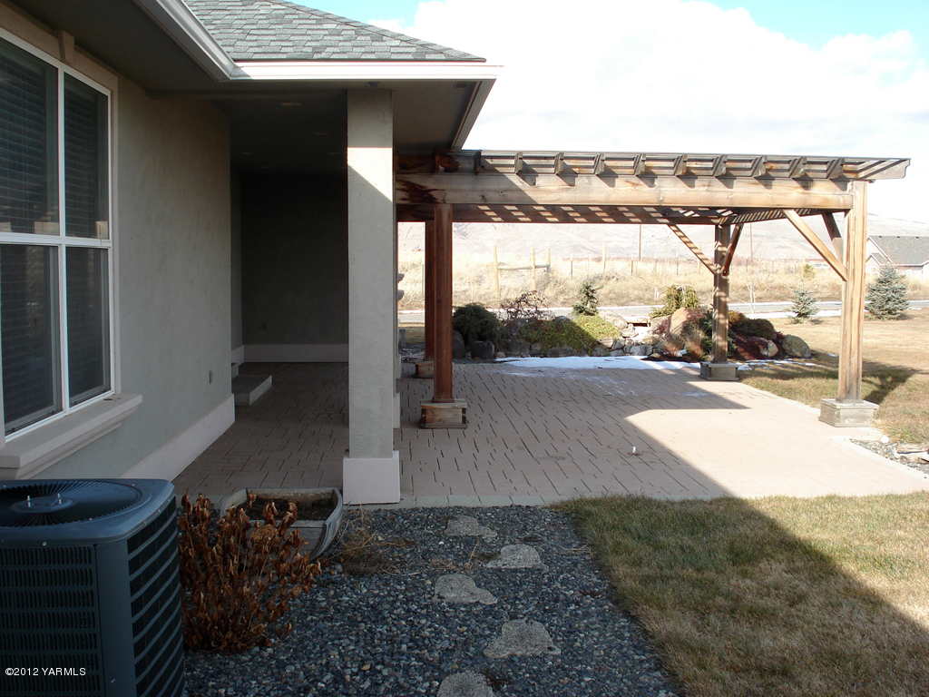 840 Dilley Road Tieton, WA 98947 - Photo 23 of 23 a view of a porch with furniture and a yard