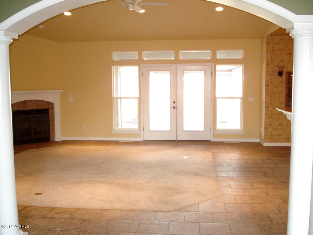 840 Dilley Road Tieton, WA 98947 - Photo 4 of 23 a view of an empty room with a window
