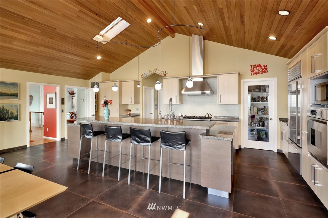 632 Fieldston Road Bellingham, WA 98225 - Photo 13 of 40 a large kitchen with a table and chairs