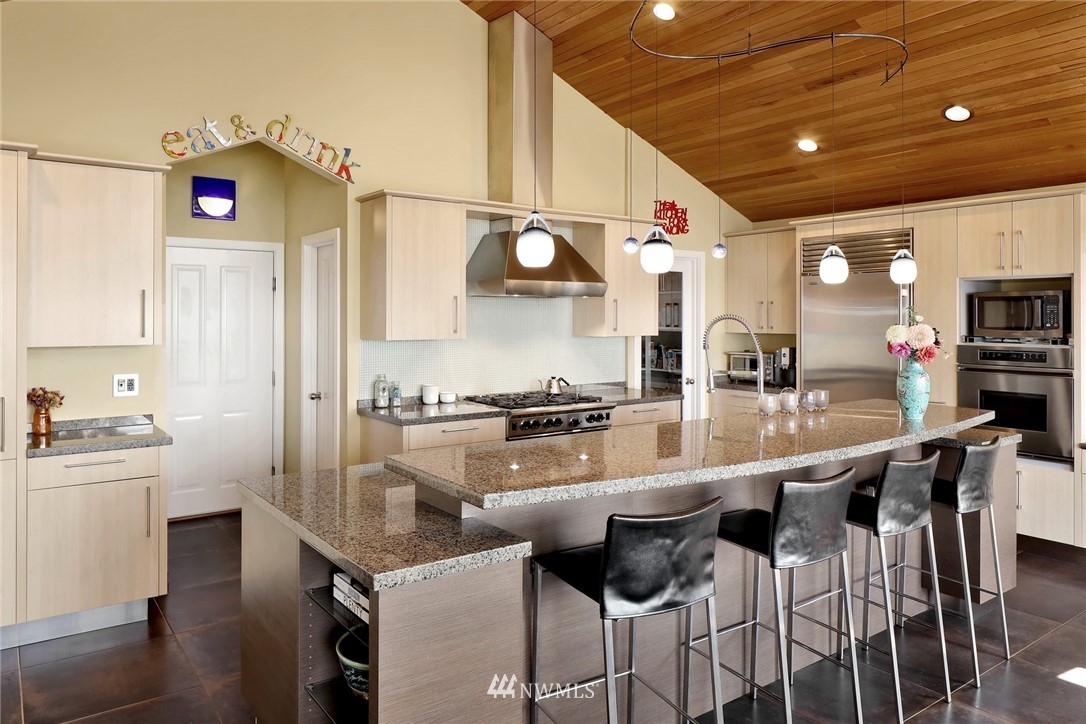 632 Fieldston Road Bellingham, WA 98225 - Photo 14 of 40 a kitchen with stainless steel appliances granite countertop a sink and cabinets