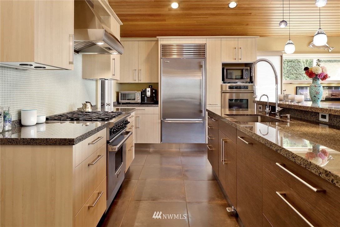 632 Fieldston Road Bellingham, WA 98225 - Photo 15 of 40 a kitchen with granite countertop a sink stainless steel appliances and cabinets