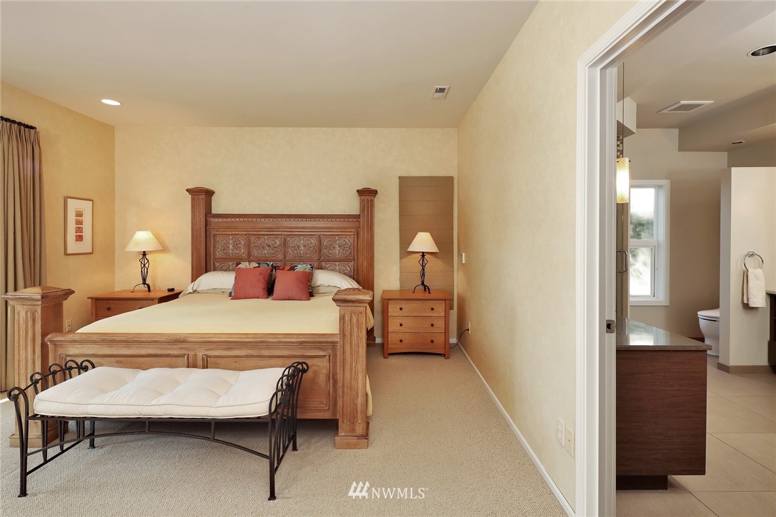 632 Fieldston Road Bellingham, WA 98225 - Photo 22 of 40 a bedroom with a bed and a view of living room