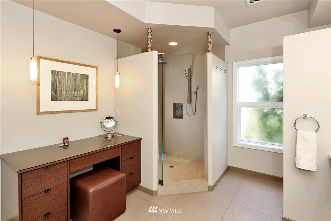632 Fieldston Road Bellingham, WA 98225 - Photo 24 of 40 a bathroom with a shower sink and mirror