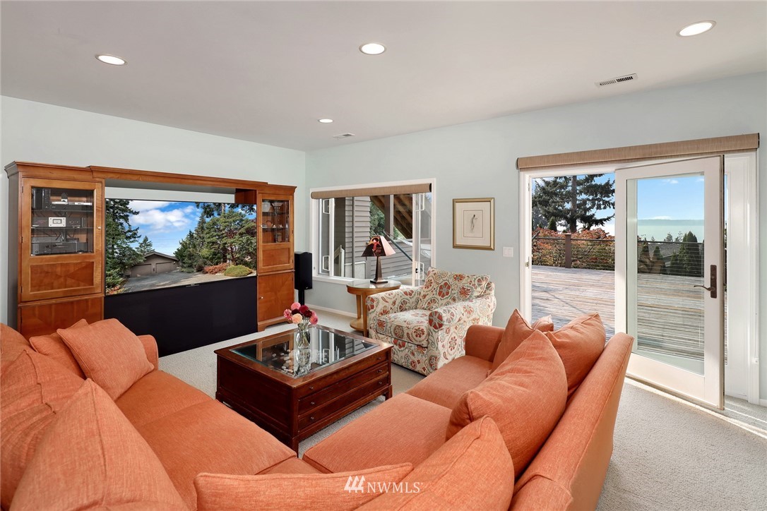 632 Fieldston Road Bellingham, WA 98225 - Photo 27 of 40 a living room with furniture and a flat screen tv