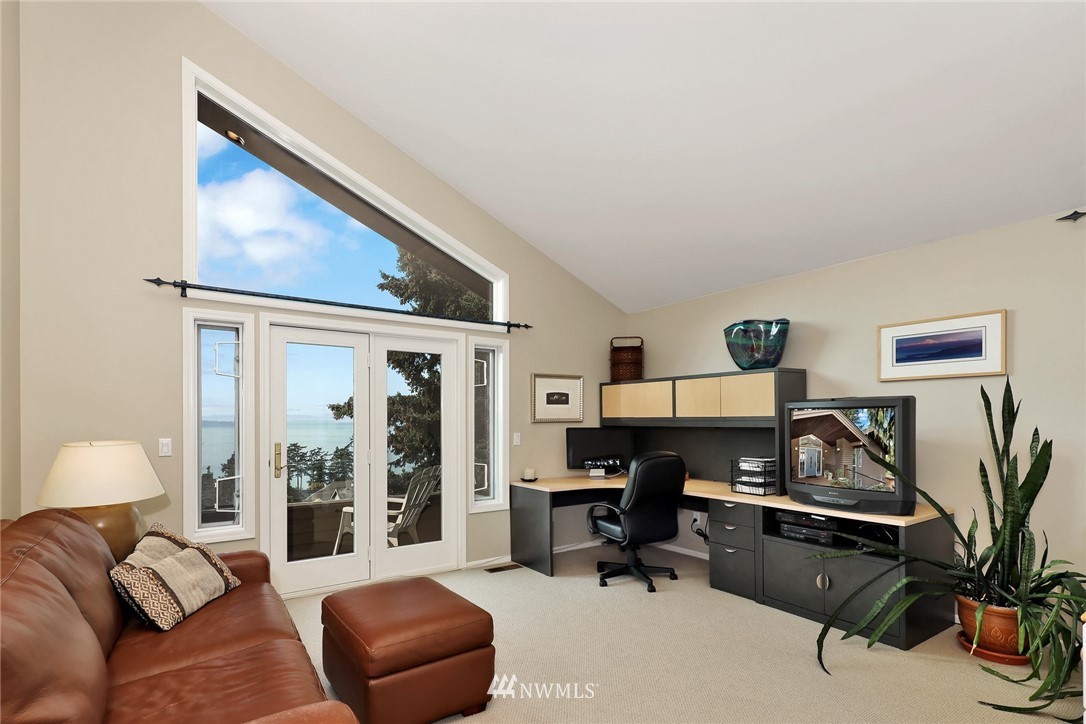 632 Fieldston Road Bellingham, WA 98225 - Photo 30 of 40 a living room with furniture and a flat screen tv