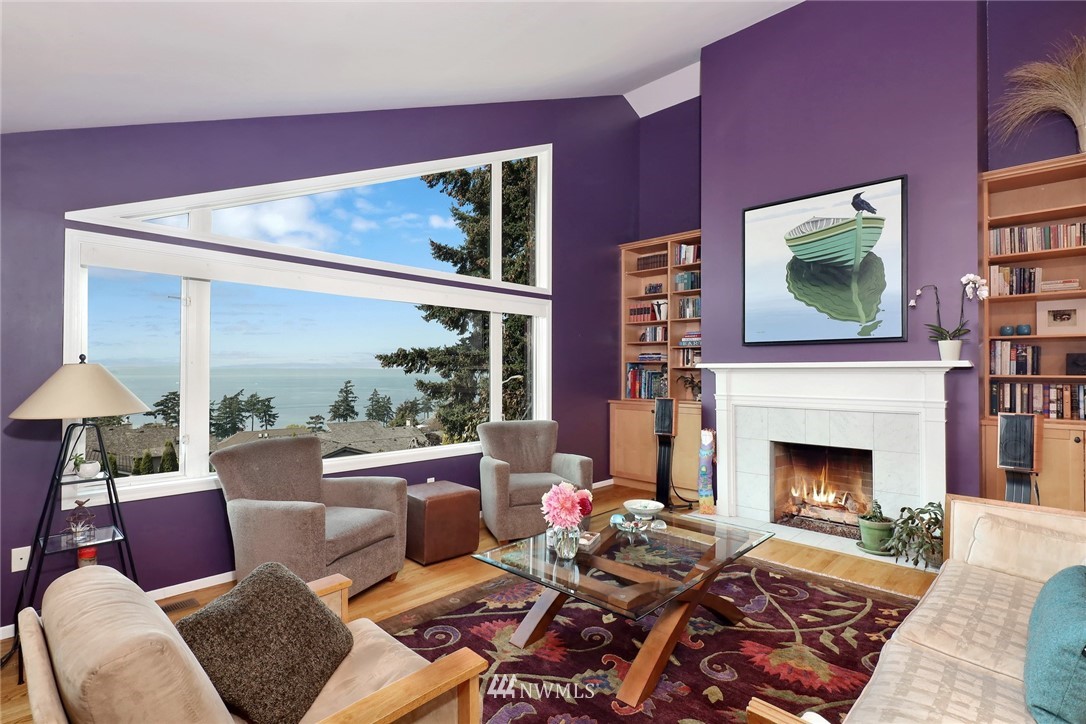 632 Fieldston Road Bellingham, WA 98225 - Photo 8 of 40 a living room with furniture a window and a fireplace