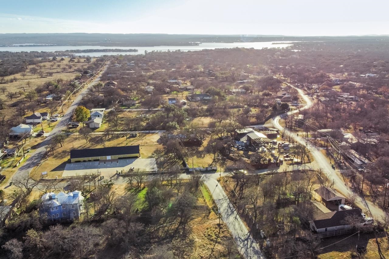 an aerial view of residential house with parking space