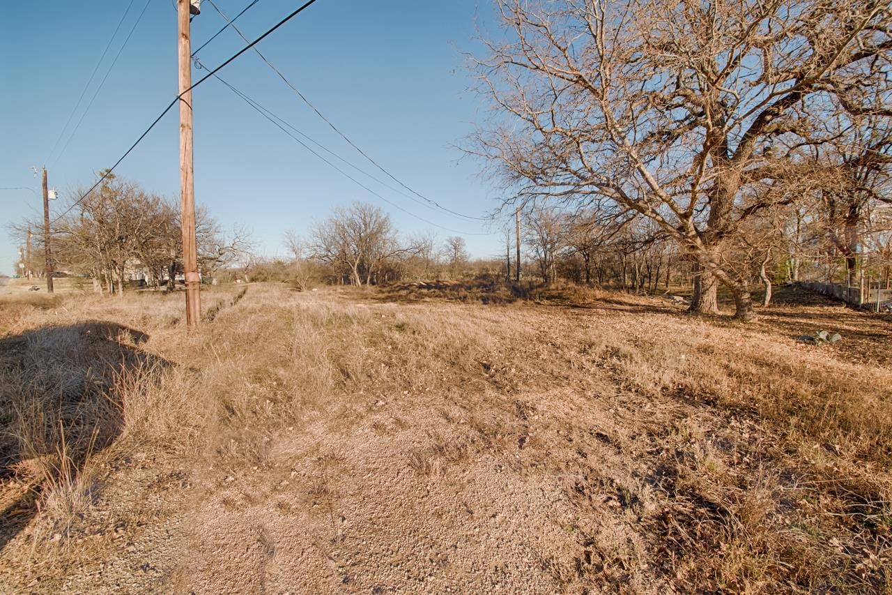 2802 Valley View Lane Granite Shoals, TX 78654 - Photo 3 of 14 a view of dirt yard with a large tree
