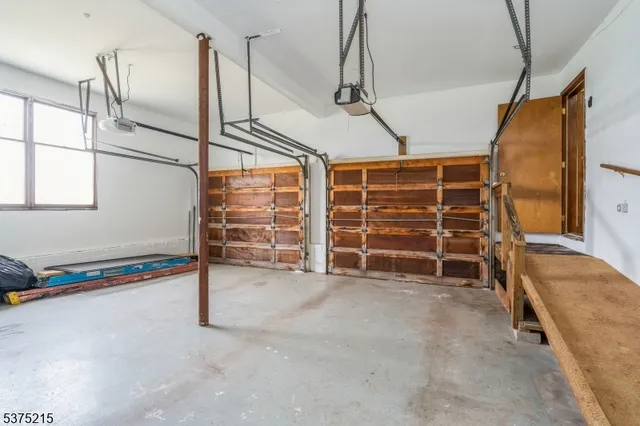 a view of an empty room with a street