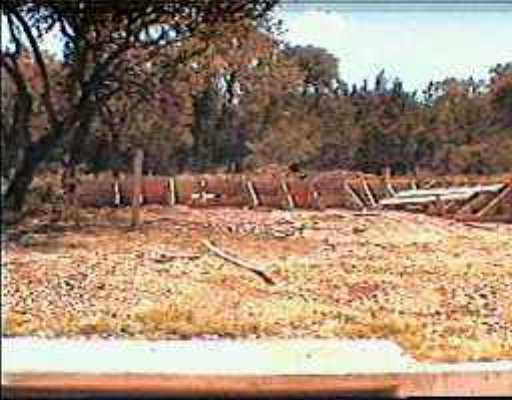 a view of snow on the side of a road