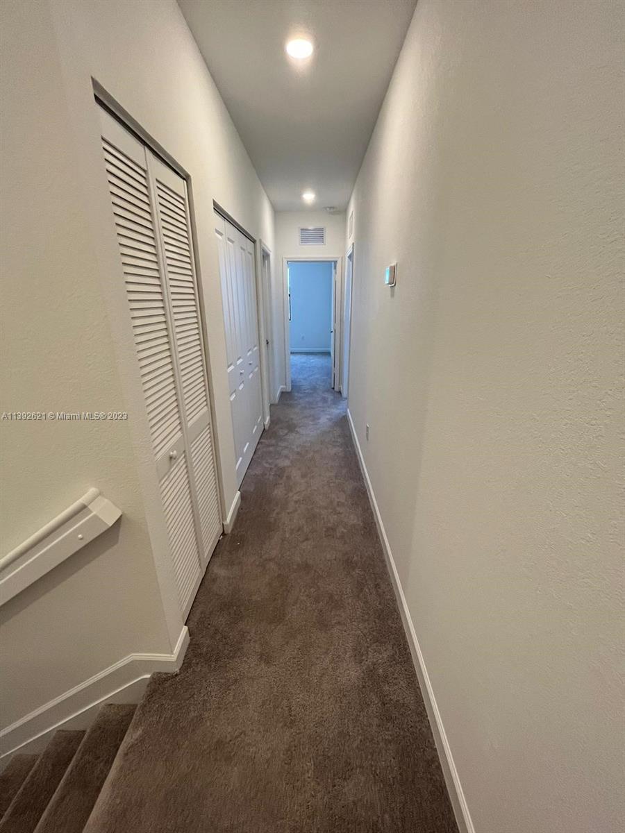 Miami-Dade County Homestead, FL 33032 - Photo 30 of 41 a view of a hallway