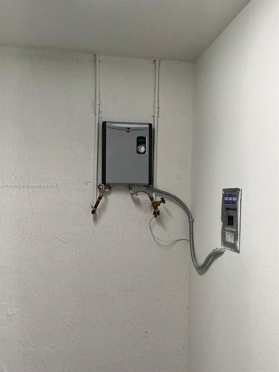 Miami-Dade County Homestead, FL 33032 - Photo 39 of 41 a bathroom with a shower