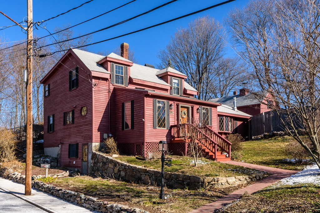 a front view of a house with street