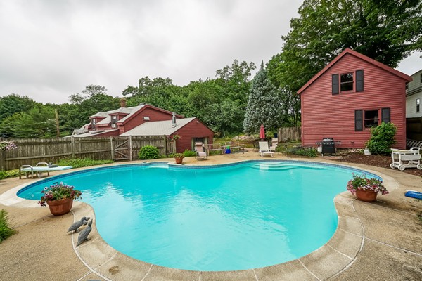 63 Johnson Street Boston, MA 02132 - Photo 12 of 13 a view of a swimming pool with lounge chair