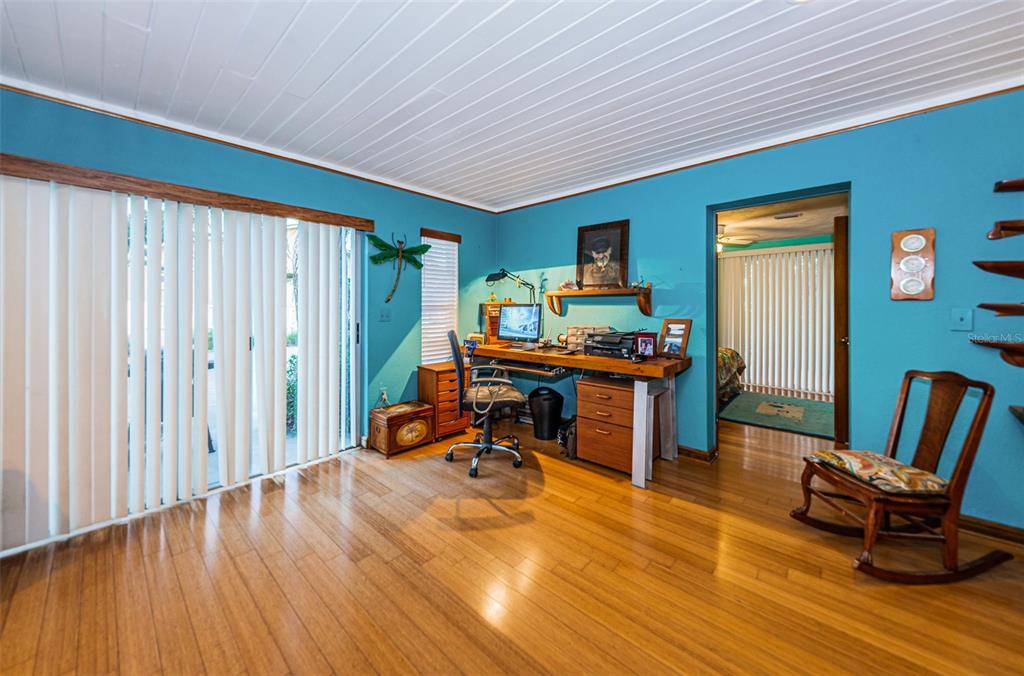 330 North Spring Boulevard Tarpon Springs, FL 34689 - Photo 18 of 34 a view of a workspace with furniture and lounge chair