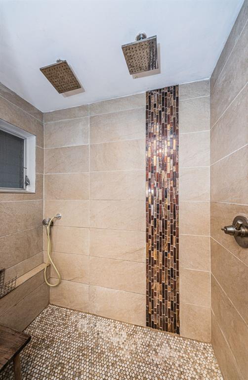 330 North Spring Boulevard Tarpon Springs, FL 34689 - Photo 22 of 34 a bathroom with a shower