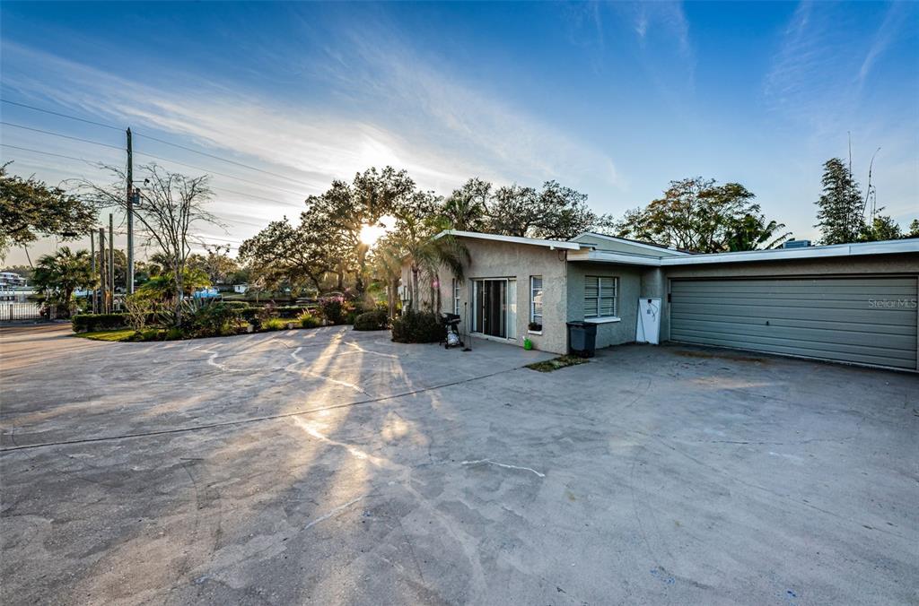 330 North Spring Boulevard Tarpon Springs, FL 34689 - Photo 29 of 34 a view of a house with a yard