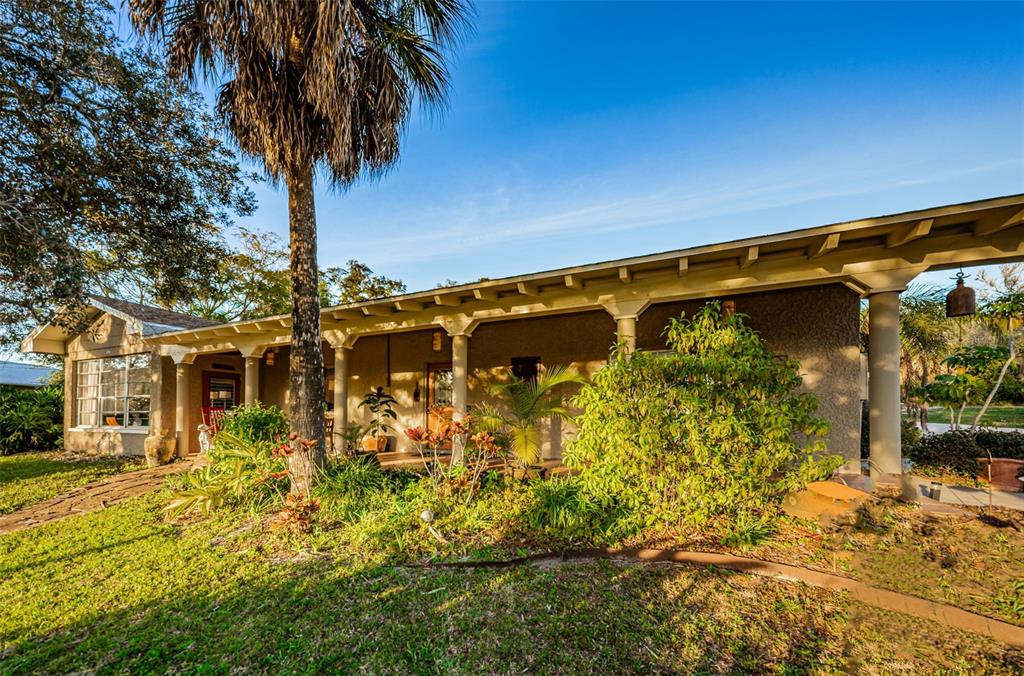 330 North Spring Boulevard Tarpon Springs, FL 34689 - Photo 6 of 34 a view of a garden