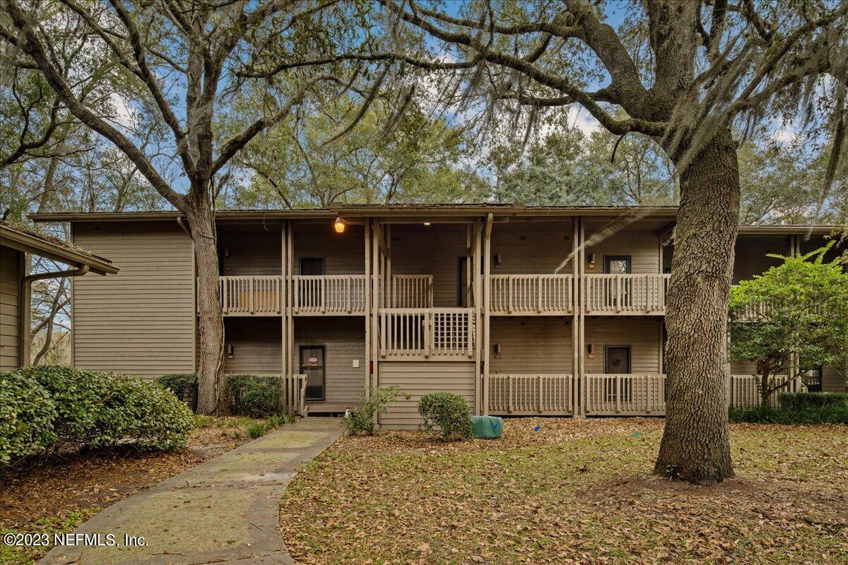 3155 Ravines Road, Unit 3522 Middleburg, FL 32068 - Photo 1 of 20 a front view of a house with a yard