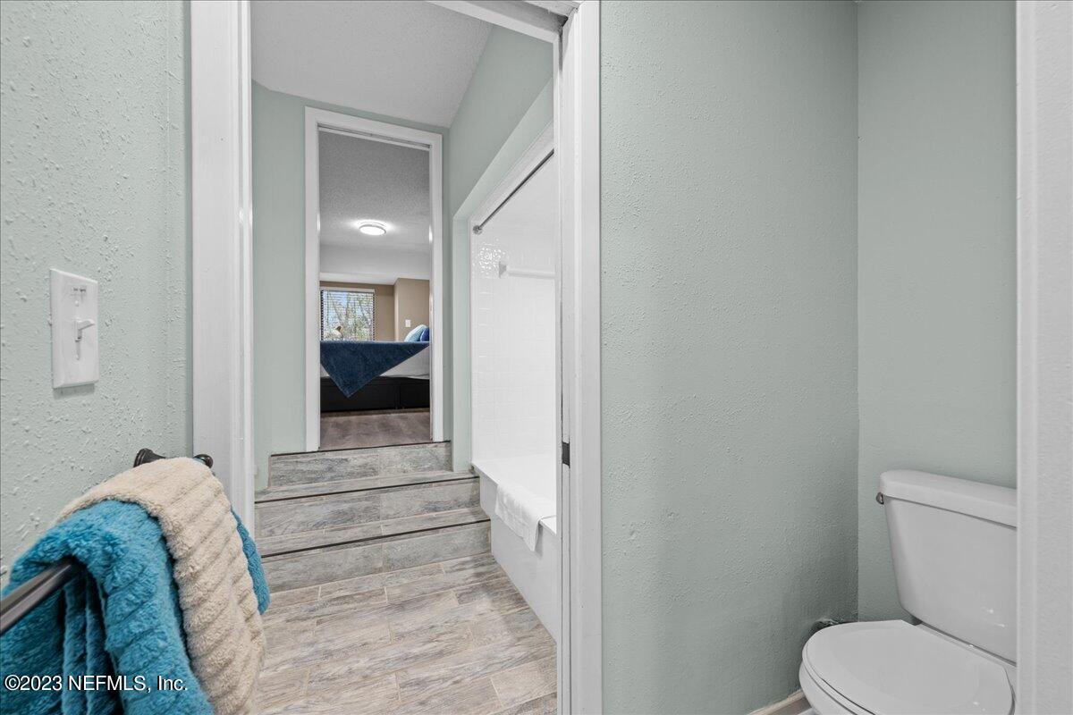 3155 Ravines Road, Unit 3522 Middleburg, FL 32068 - Photo 15 of 20 a bathroom with a sink and toilet