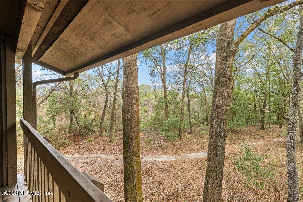 3155 Ravines Road, Unit 3522 Middleburg, FL 32068 - Photo 18 of 20 a view of a glass door and a porch